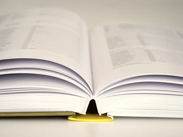 An open book with a passage marked in the margin